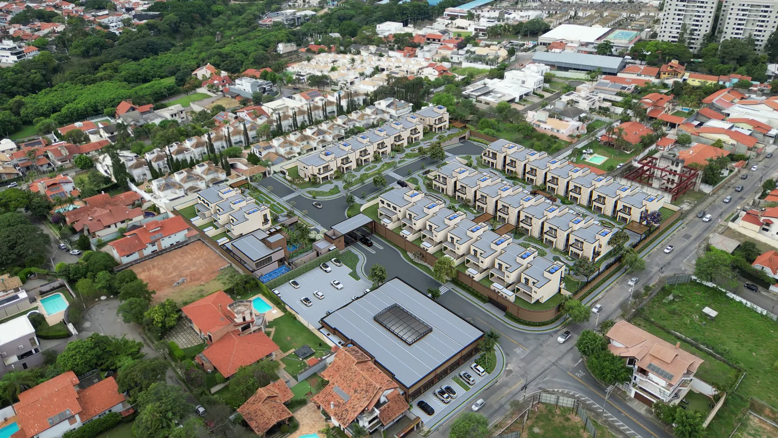 Foto aérea do bairro com a perspectiva do Jardins de Victoria inserida no terreno, entre as casas e as ruas do Campolim